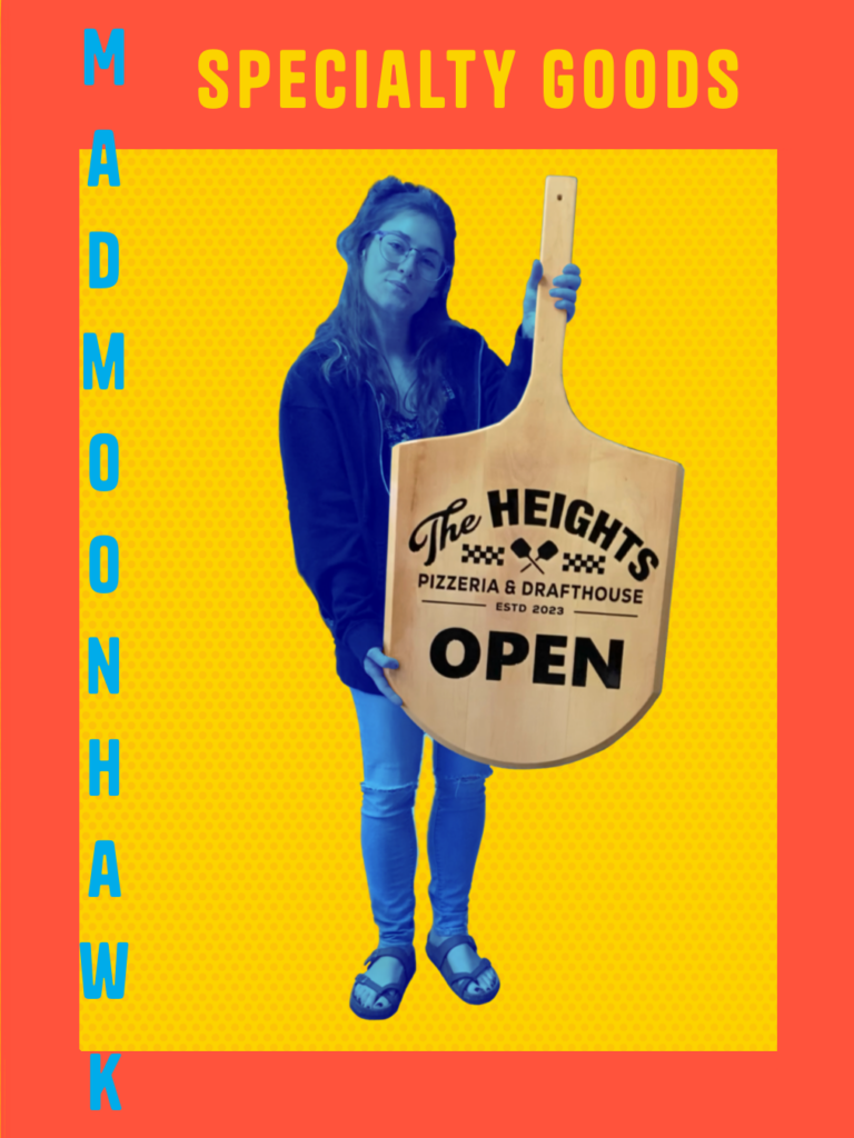 a yellow background with a red frame, inside a blue tinted photo of a girl holding a sign in the shape of a pizza paddle reading: THE Heights pizzeria. on the frame it says Madmoonhawk, specialty goods 